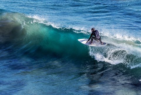 Photo by Vladimir Kudinov: https://www.pexels.com/photo/man-in-white-surfboard-67386/